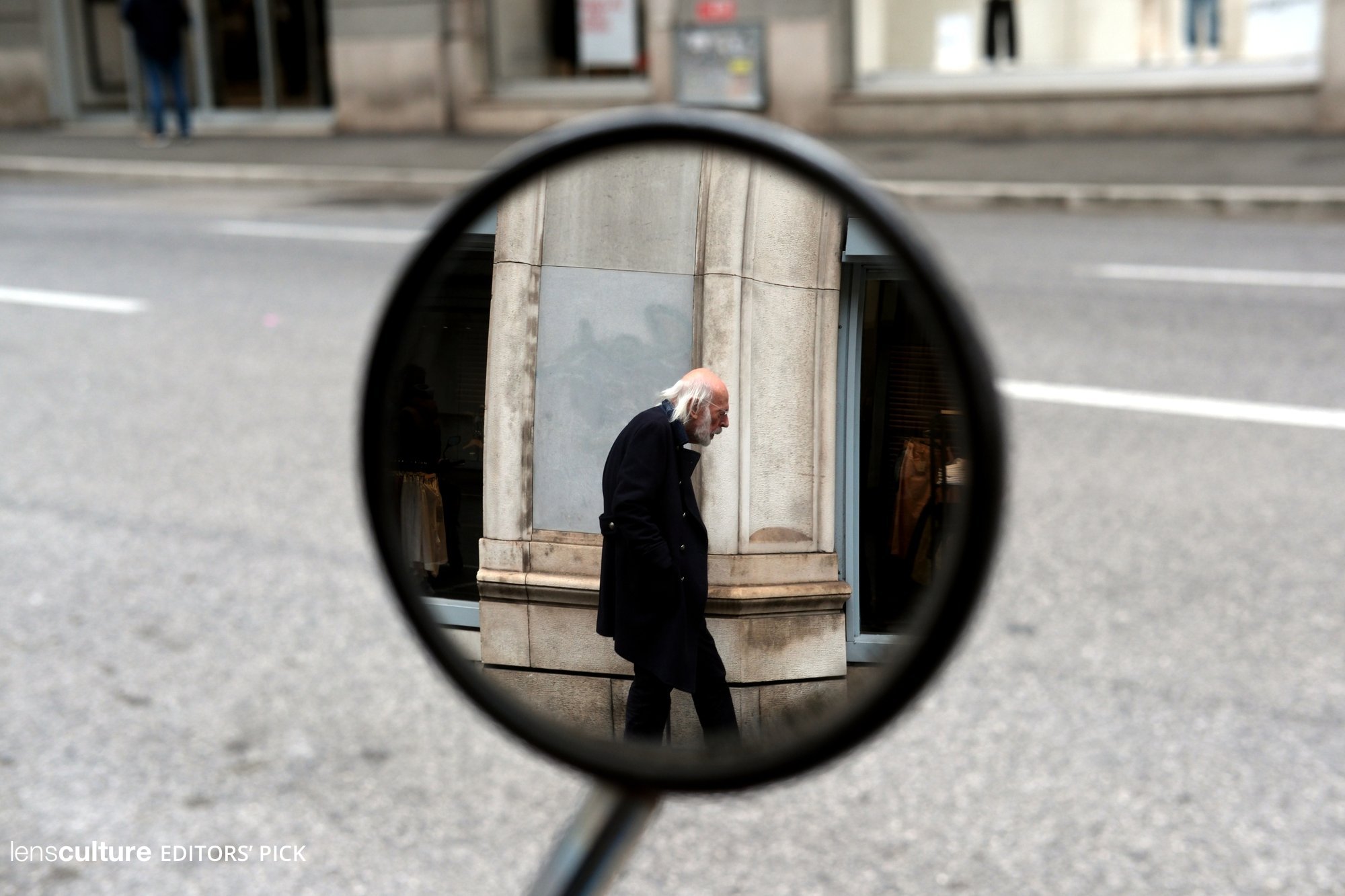 Old Man in Mirror Reflection