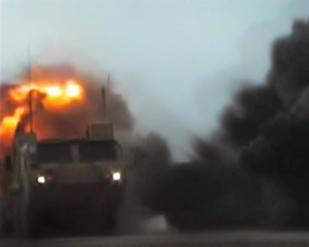 Early morning IED attack (Distantly filmed by the enemy).