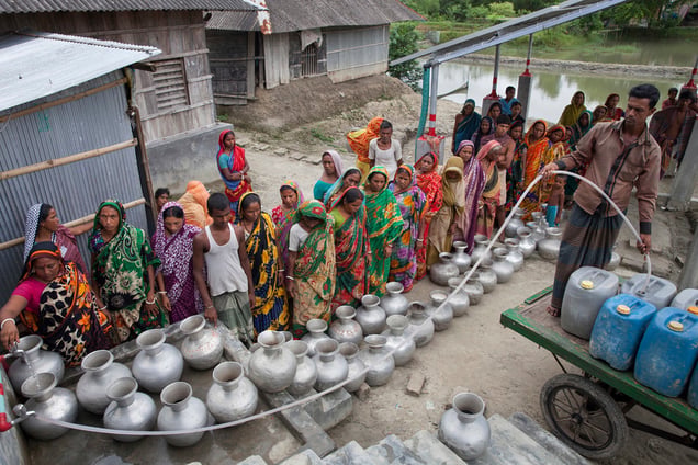 People gather to collect drinking water from Reverse Osmosis Plant of an NGO's Project in Shyamnagar, Satkhira, Bangladesh.
