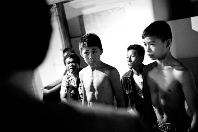 Boys are waiting for the upcoming boxing match.  © Sandra Hoyn