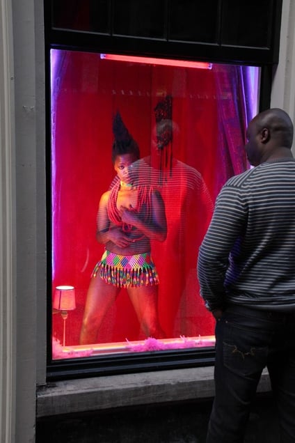 Documentation of intervention, Red Light District, Amsterdam. From the series "Being (T)here" © Zanele Muholi, courtesy of Huis Marseille