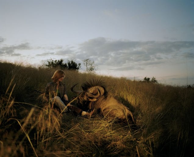 huntress with wildebeest, namibia-from the series 'hunters'-David Chancellor