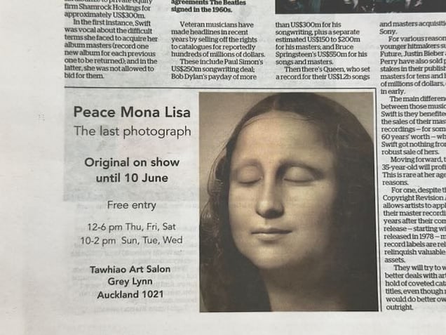 newspaper ad for the last photograph - original on show
