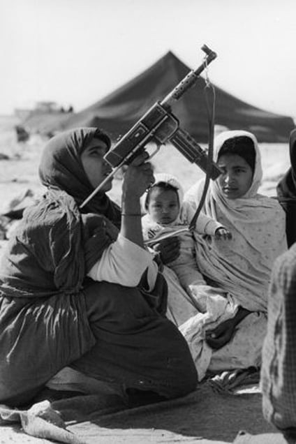 The Western Sahara. Women in training. 1976. From the book "War Photographer: Between Shadow and Light" © Christine Spengler