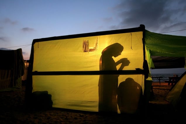 Shirat Hayam, Jul 05 - Jewish settler during evening prayer in her hut © Natan Dvir