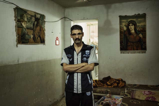 "We don't complain about the rats and mice: we live with them, we got used. But the snakes, those are dangerous, they are silent, and they bite." Imad, 38, lives in a 12 square meters room in a basement of a disused building at the centre of the bazar, for which he pays 300.00 IQD (250 USD) per month. A former employee of the ministry of industry in Falluja, Imad lives with his wife and two kids.