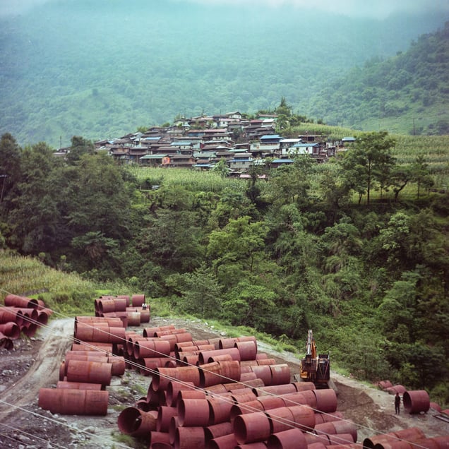 Naiche, a primarily Gurung village in Lamjung renowned for wild honey hunters, stands at a crossroads. Its traditional identity is now contending with modernisation driven by four hydropower projects, which bring roads, newer construction methods, and outside influences.