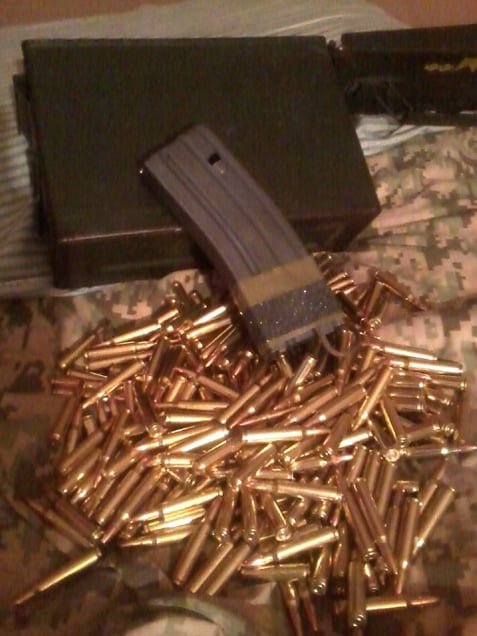 Sharrod's photograph of his bullet casings. From the series "I slowly watched him disappear" © Jason Hanasik