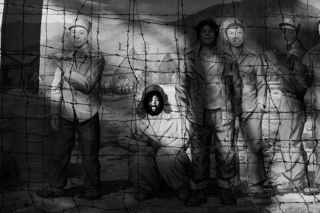 History Park at the "Geoje POW Camp" in South Korea. The history park is comprised of a succession of image walls recapturing the experience of war prisoners in the 1950s.