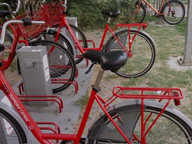 A public bike-sharing station. Cycling infrastructure as part of the everyday residential environment.