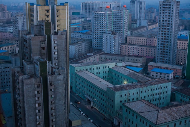 At dusk, the skyline of central Pyongyang, North Korea, 12 April 2011.