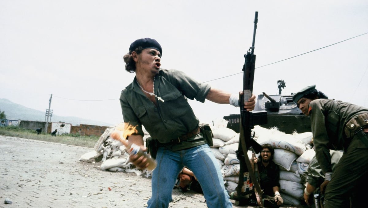 Sandinistas at the walls of the National Guard headquarters: "Molotov Man," Estelí, Nicaragua, July 16, 1979 © Susan Meiselas / Magnum Photos. Courtesy Thames and Hudson.