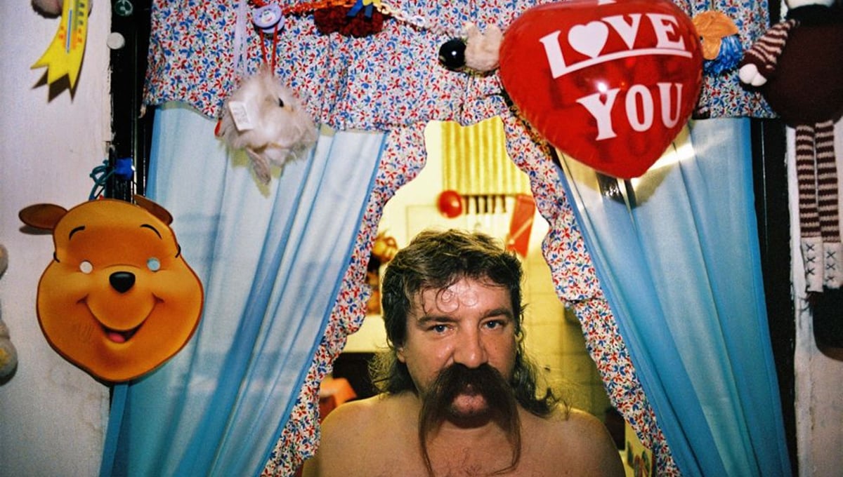 Pato, 52, has been unemployed for a long time.  He just gets occasional jobs and lives in the rented flat with his wife and four children. Kosice, 2004. © Andrej Balco