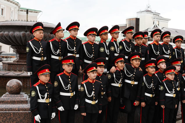 Primary school students gather for a group photo at a patriotism-themed event at Lenin Square in Ulan-Ude, Republic of Buryatia on May 16, 2024.