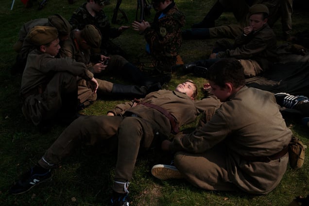 A unit dresses to re-enact Soviet Russia during WWII as part of their historical education in Borodino, Russia. 26 July 2016. The camp offers reenactments of historical periods of war. Borodino is famous for a battle fought on 7 Sep 1812 - the deadliest day of the Napoleonic Wars.