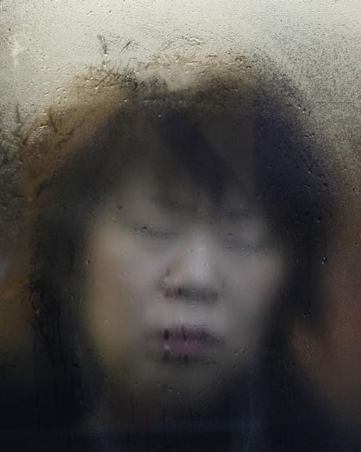 From the book and series, "Tokyo Compression" © Michael Wolf