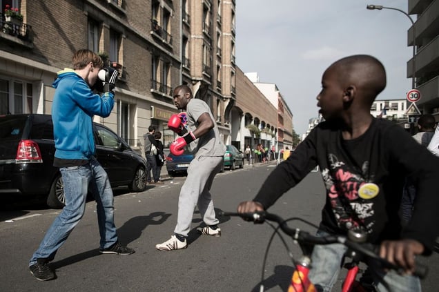 Two men having a boxe training in a closed street. © Hugo Aymar