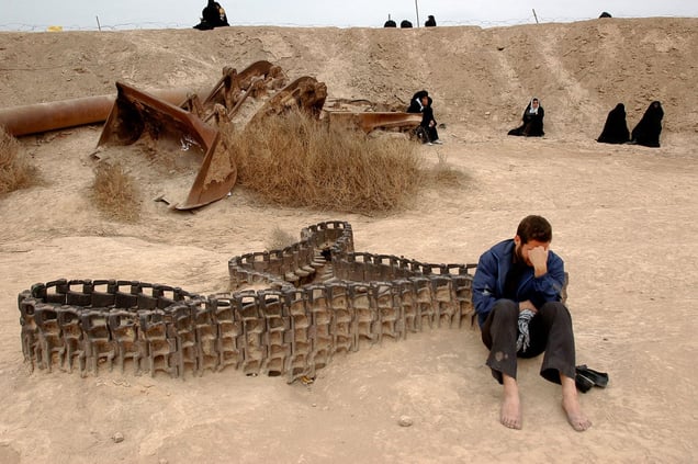 Shade of Earth. Talaiye, near the Iraq border, March 23, 2008. Every March, at the time of the New Year, hundreds of thousands of Iranian visit the old fronts of the Iran-Iraq War to pay their respects.