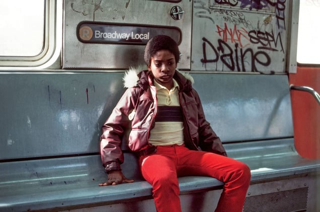 Young Man on the Train, Long Island City, NY, 1985 © Robert Herman