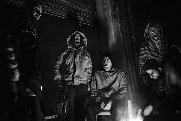 During clashes at night, with power cut off in the area around Syria Street, the front line between the Sunni district of Bab al-Tabbaneh and the Alawite district of Jabal Mohsen. © Alfonso Moral / CosmosWinner of the Pierre & Alexandra Boulat Award 2015