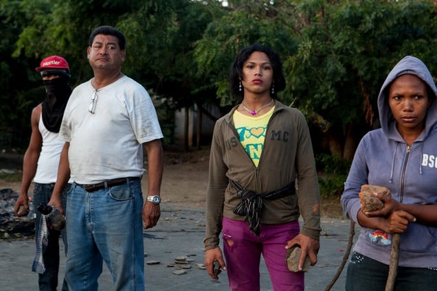 Octavio Ortega (2nd from the left). Octavio was one of forty demonstrators from Rivas arrested and held in custody on December 23, 2014. Three days later he and one other, named Ronald, were still being held. © Adrienne Surprenant / Hans Lucas