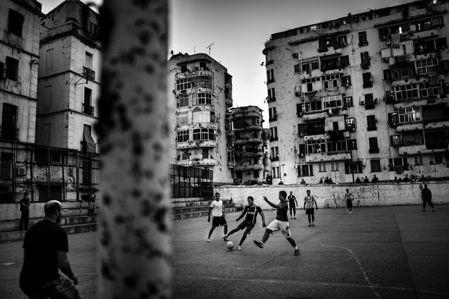 The games provided up to a week in advance, are linked throughout the day on the few football fields of Babel Oued center. Photo by Romain Laurendeau