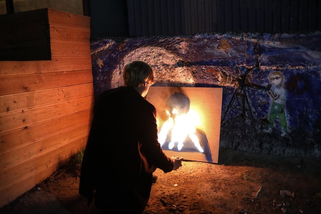 An independent artist creates artwork at a bar in Irkutsk on May 12, 2024. Many young people expressed an overwhelming uncertainty about the future.