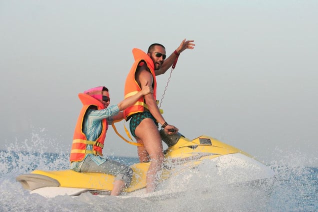 A beach on Kish Island, in southern Iran, where Iranians go to relax. They enjoy more freedom here. Yet, Iranian women are not allowed to swim in bathing suits, they must cover up even in the water. Kish Island, IRAN - April-May 2006
© Copyright 1979-2009 Alfred Yaghobzadeh. All rights reserved.