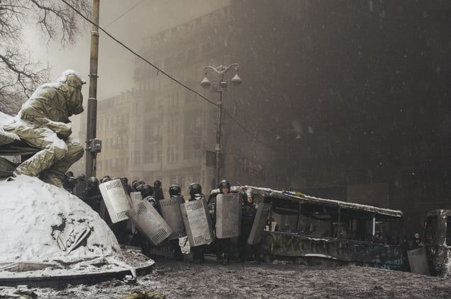 Riot police returned to their former positions leaving the area near Lobonovskogo stadium after the crackdown of protesters in the center of Kiev on Jan. 22, 2014.