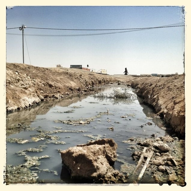 Open streams of waste water can be found at multiple locations across the camp