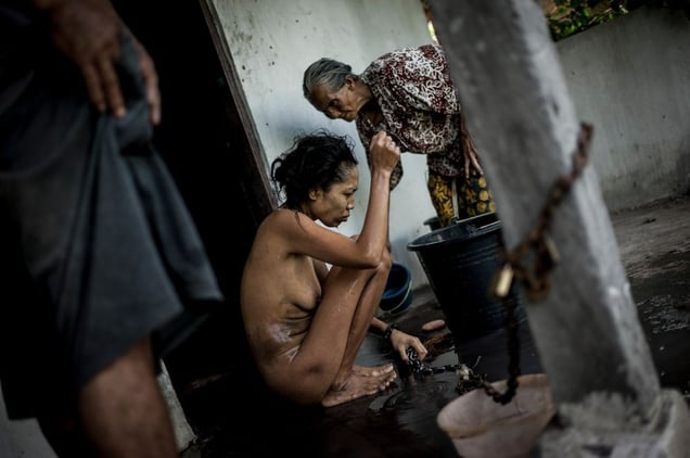 The only support that families receive from the state for their mentally ill family members, is a concrete shack which is built to lock away the “possessed”. The last time she got washed was two month ago. © Christian Werner