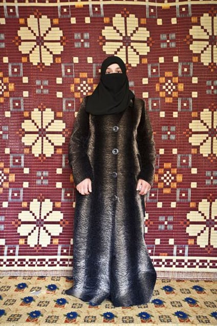 Tripoli, Lebanon. Samira, 28 years old, came from Hama almost three months ago, together with her four kids. She had to change five cars and bribe her way through the military checkpoints up to the Lebanese border. It cost her 400 USD, four times the average monthly wage of her husband. She now lives in Tripoli. "I miss the soil of Syria, the land," she explains. © Matilde Gattoni