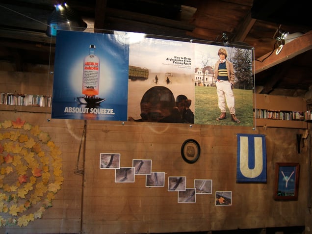 'Ménage à trois,' two triptychs, shown unaltered as originally published, New York Times Magazine covers—with gatefold (right panel), July 28, 2002, and April 2, 2006  (shown back-to-back, suspended in center of garage)