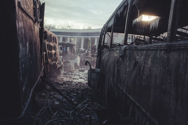 Burned and icy buses after several days of confrontation between protesters and police on  Hrushevskoho street. Kiev, Jan. 20, 2014