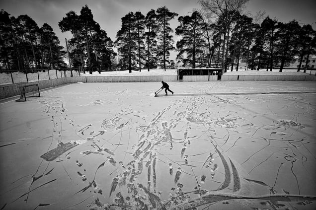 Evgeny Solovyov, head coach of HC Vetluga preparing the stadium for the match in Vetluga, Russia, 19 February 2015.