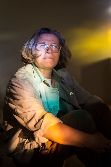 Fiorella, 58 years old, portrayed in the chapel of Shalom House in Rome where she seeks refuge to escape from electromagnetic radiations.