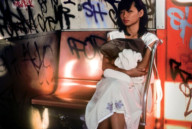 Woman on the Train, Long Island City, NY, 1985 © Robert Herman