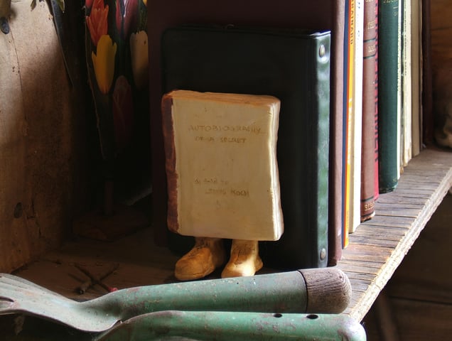 Ceramic self-portrait as book, 'The Autobiography of a Secret, as told to Lewis Koch,' 2000.