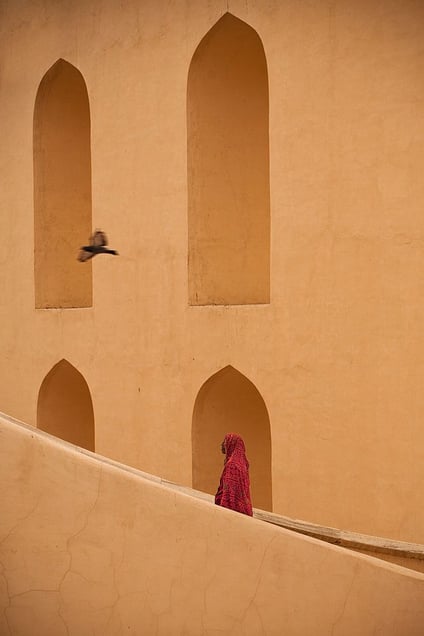 Jaipur, India:. The woman is cleaning the stairway of the observation tower of the large sundial at the Jantar Mantar observatory. © Matjaz Krivic