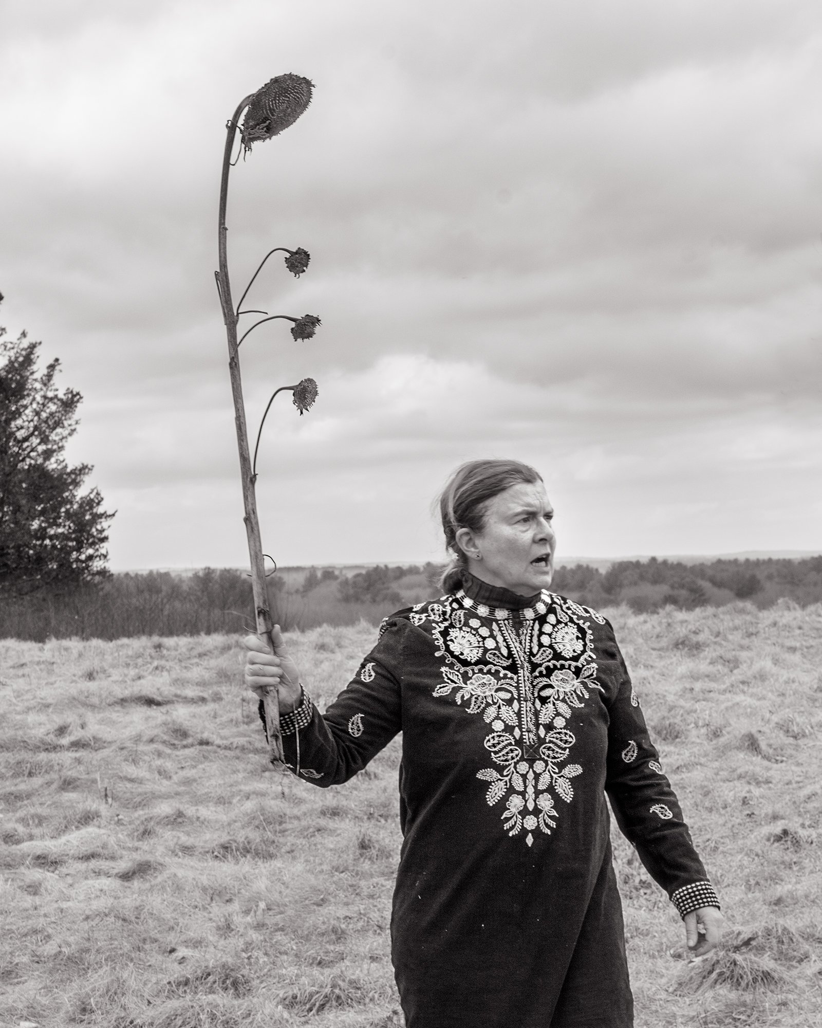 Grace with sunflower, 2022 © Scott Offen