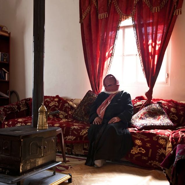 Jdeideh, Lebanon.Nour, 45 years old, escaped from Al Qusair with her kids after the army had entered their house when they were away, and left women's lingerie hanging across the dining room and wrote a message on a wall that said "You are lucky your women were not here." Her husband decided to escape before they would come back and rape the women. © Matilde Gattoni