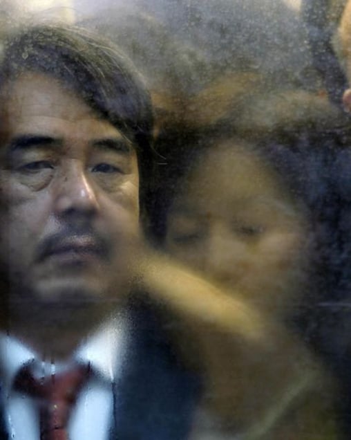 From the book and series, "Tokyo Compression" © Michael Wolf