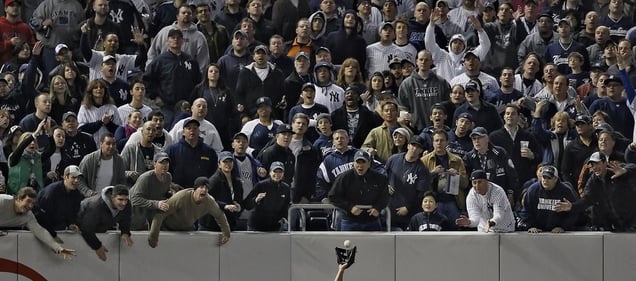 1st prize Sports Features Singles. © Robert Gauthier, USA, Los Angeles Times Magazine. Yankee fans try to distract Angels left fielder Juan Rivera, Yankee Stadium, 25 October