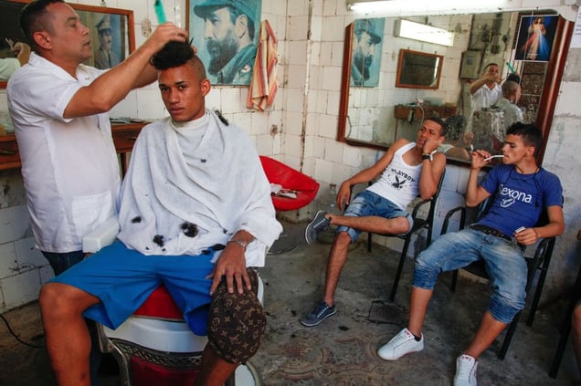 Miguel at a barber shop, Havana © Mariette Allen