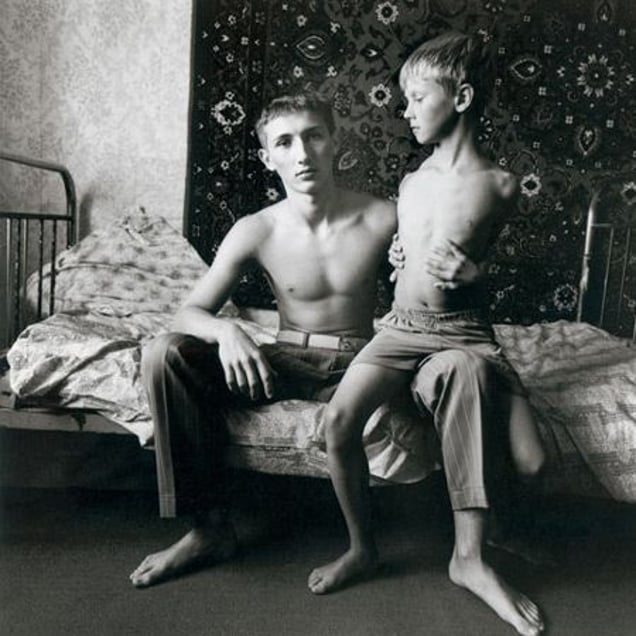 Jenya and Vitally on a Spring Bed, Russia, 2003, from Strangely Familiar by Michal Chelbin, Aperture 2008 © Michal Chelbin