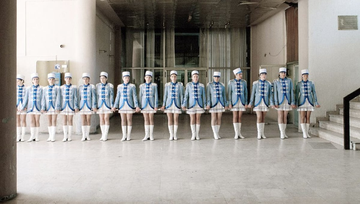 The majorettes were seemingly everywhere during my time in Vukovar. Here they are lined up to welcome some dignitaries in the foyer of the Radnicki Dom or 'workers hall' which once stood, and still stands, at the heart of the Borovo Naselje social life.  © Colin Dutton