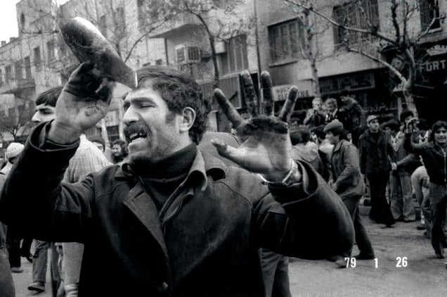 A rioter holds up his bloody hands during a violent protest against the imperial regime of the Shah in Tehran, IRAN - January 26, 1979
© Copyright 1979-2009 Alfred Yaghobzadeh. All rights reserved.
