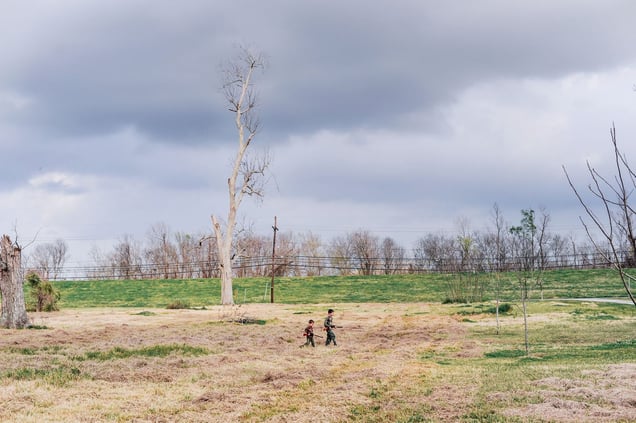 On the outskirts of New Orleans, Louisiana. 2009. Hunting rabbits with BB guns.