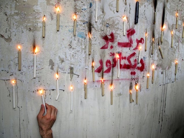 Supporters of defeated reformist presidential candidate Mir Hossein Mousavi demonstrate. Thousands of people have continued to protest in Emam Khomayni Square as a day of mourning is planned for the eight people killed in Mondays protests. Iran has banned foreign media from covering rallies in the country and Irans Guardian Council reportedly said that they would recount some of the votes in presidential election that critics say was unfairly won by Iranian president Mahmoud Ahmadinehjad Tehran. IRAN - June 2009
© Copyright 1979-2009 Alfred Yaghobzadeh. All rights reserved.