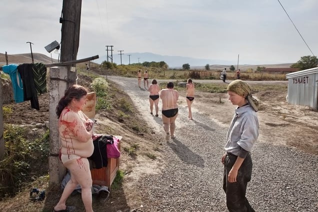 After the ritual everyone is headed to the river to wash off the blood.
From the series Apashka by © Pavel Prokopchik